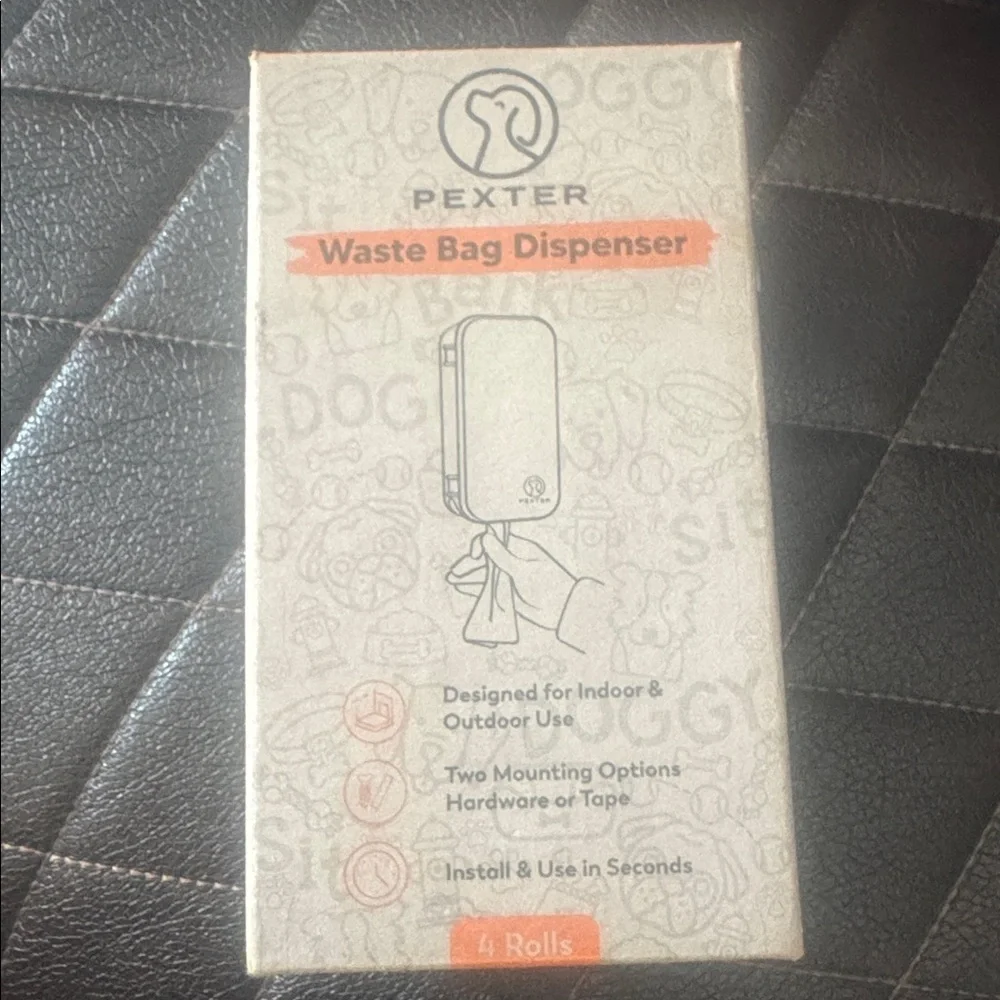 Black Dog Waste Bag Dispenser with Orange Bags